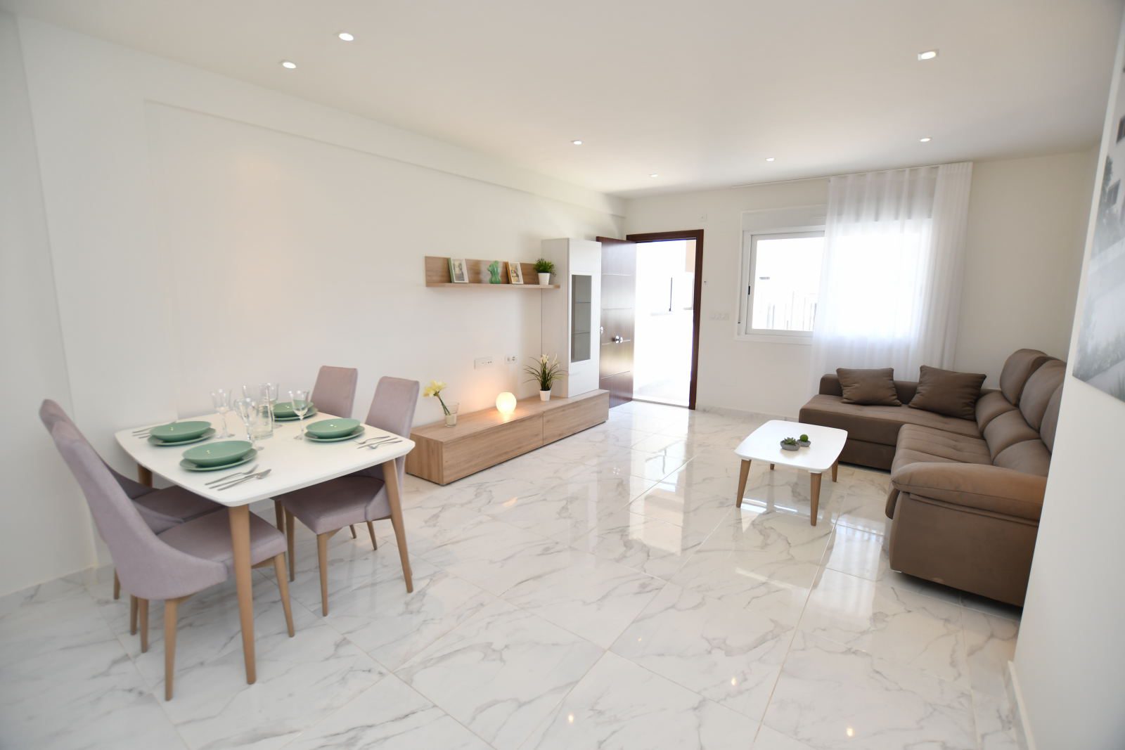 Open plan living room with clean concept at new build homes in San Miguel de Salinas